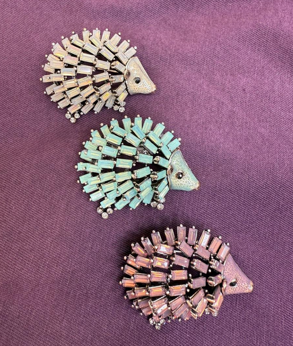 Broche heri