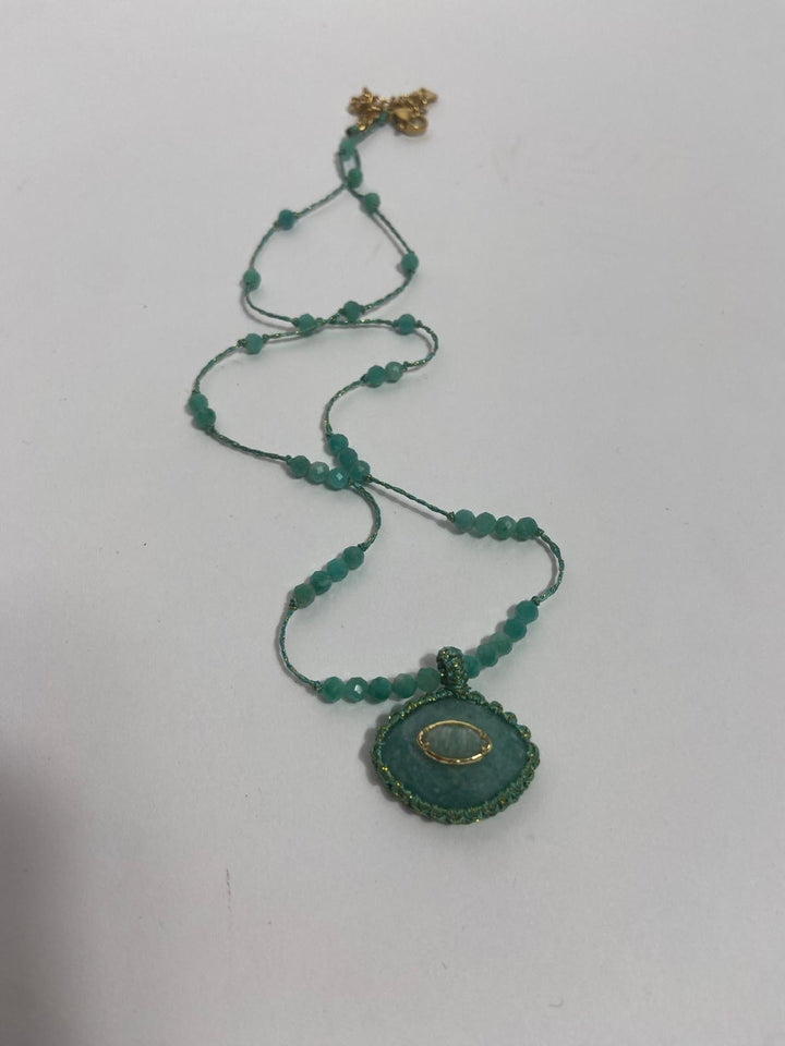 collier ojos 1